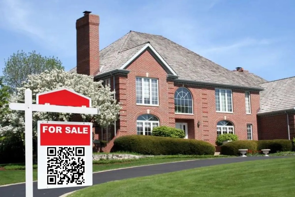 For-sale yard sign with QR code in front of brick home at 37 Alexanders Court